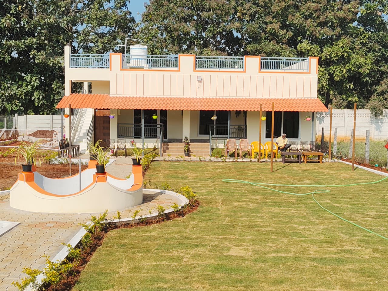 Spacious Lawn with Central Fountain & Verandah View